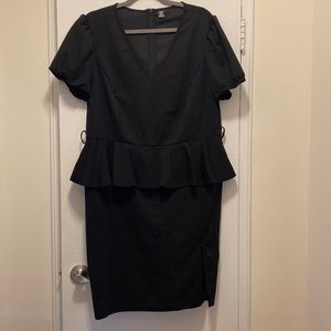 Never worn Black peplum one piece dress